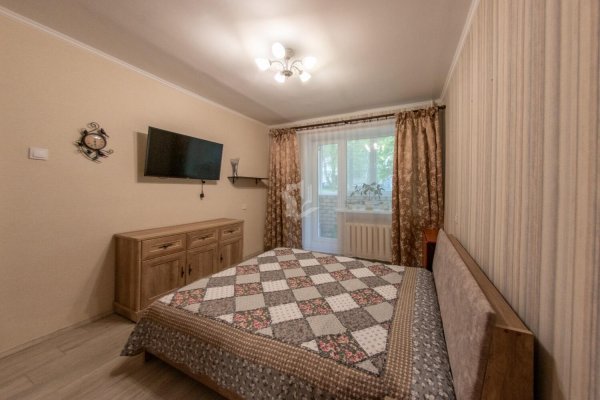 2-комнатная квартира по адресу Микрорайон 1 м-н, д. 4 - фото 2