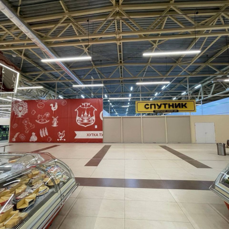 Фотография Торговое помещение в прикассовой зоне между гипермаркетами &quot;Unistore&quot; и &quot;Спутник&quot; - фото 2
